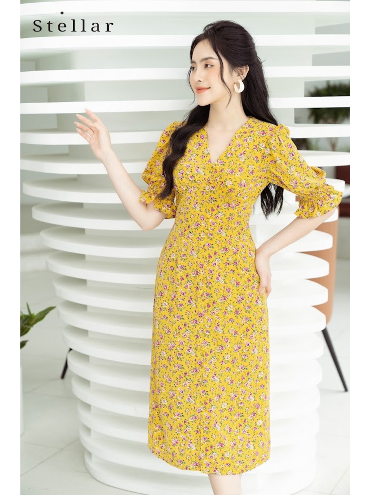 Đầm hoa midi tay bồng hoa vàng