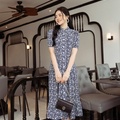 Đầm hoa cổ Đức dáng midi xoè