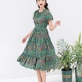 Đầm lụa hoạ tiết hoa lá xanh lá cây