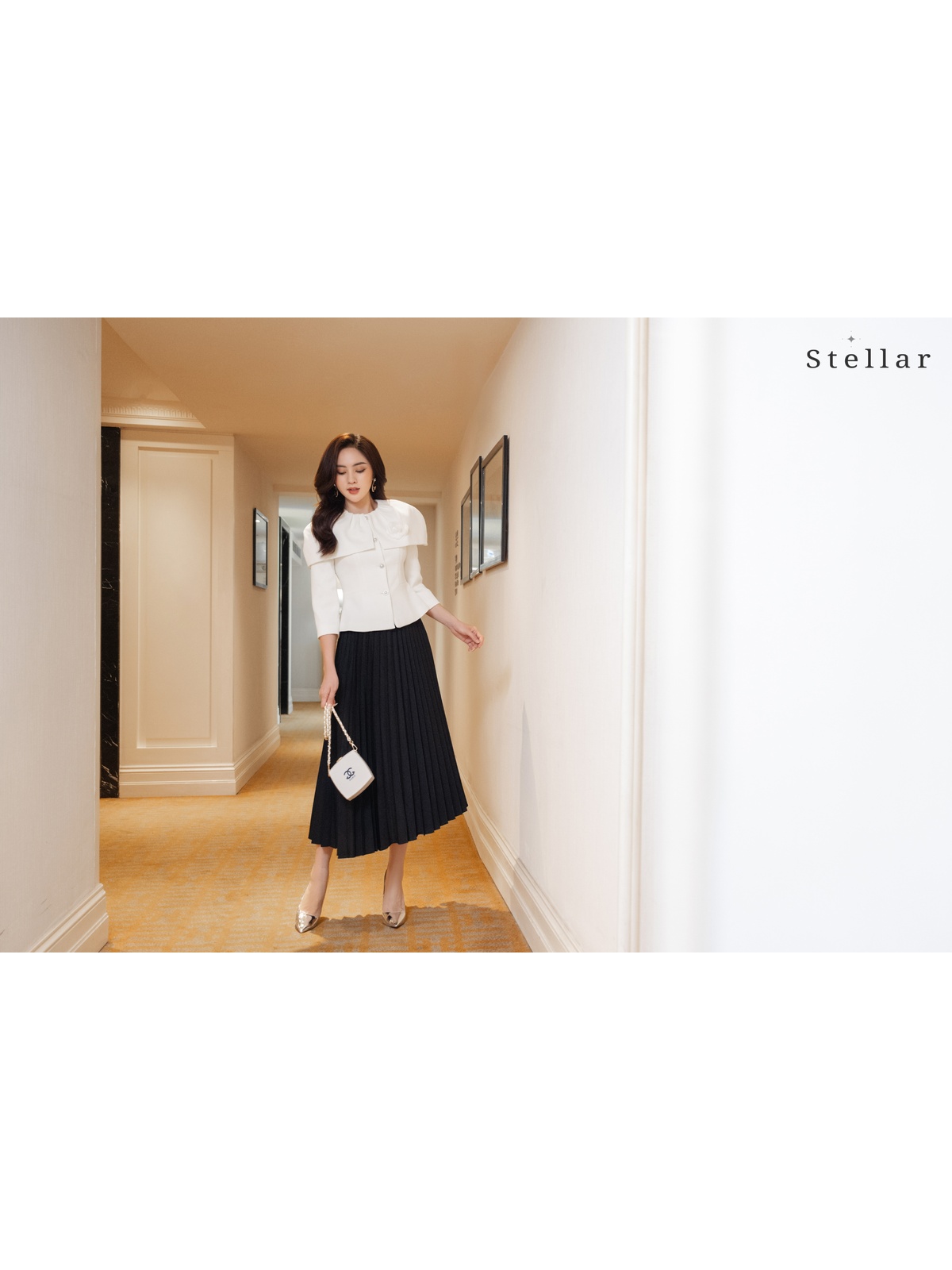 Chân váy đen dập ly dẻ quạt