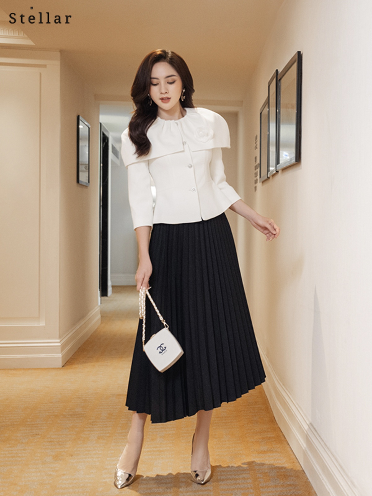 Chân váy đen dập ly dẻ quạt