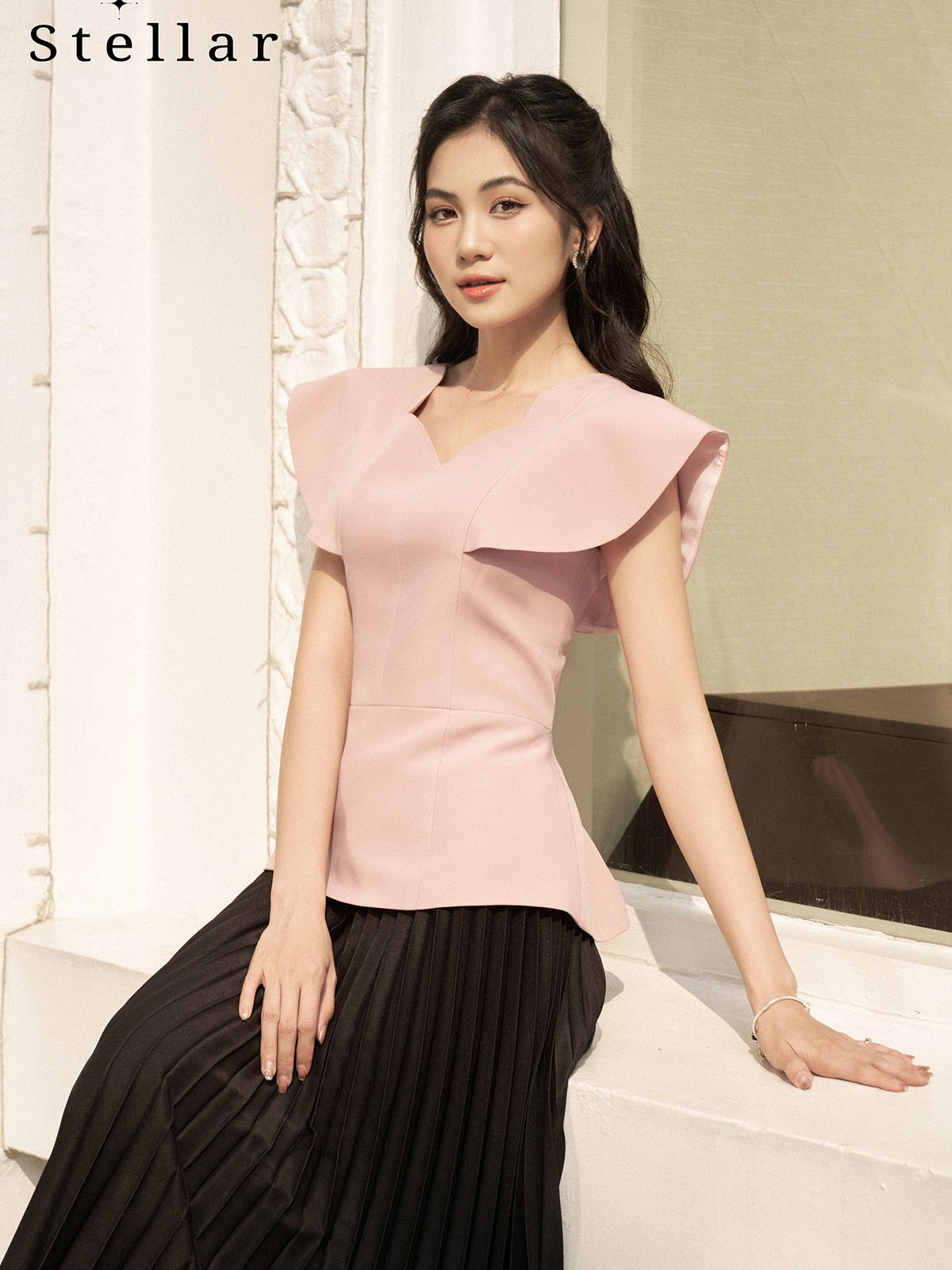 Áo hồng pastel dáng peplum