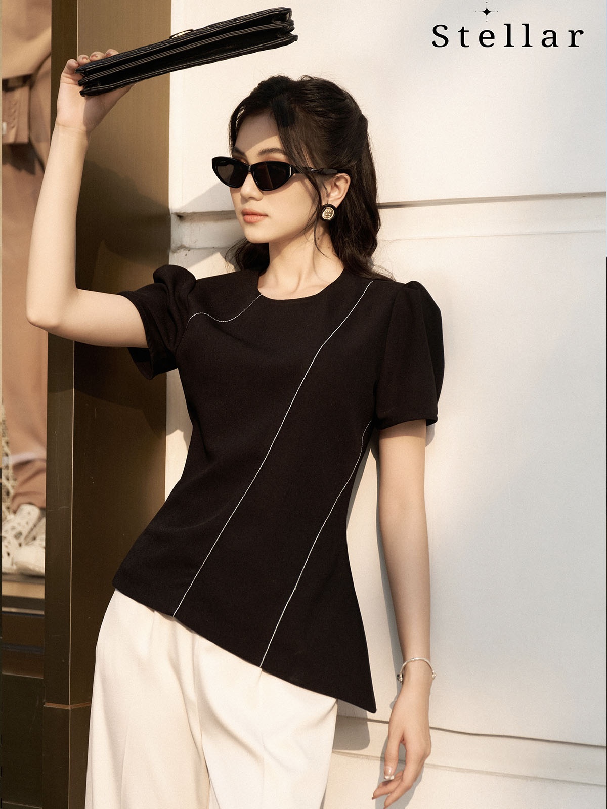 Áo đen đột chỉ trắng